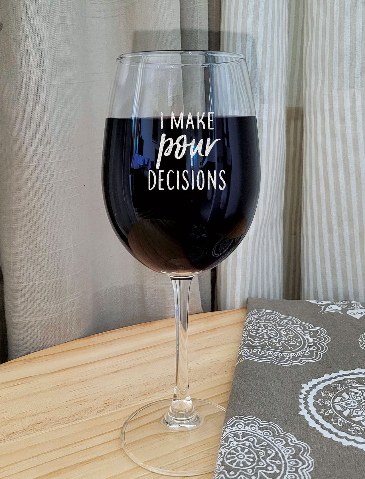 the pink magnet I Make Pour Decisions - Engraved Wine Glass